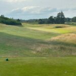 Scottish links golf course fairway with bunkers