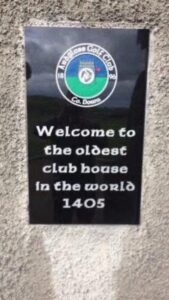 The Ardglass Golf Club plaque in County Down — welcome to the oldest club house in the world, dating to 1405