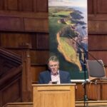 Addressing the gathering
