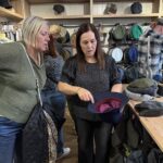 Trying on the famous Donegal tweed caps