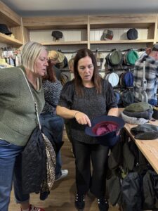 Trying on the famous Donegal tweed caps