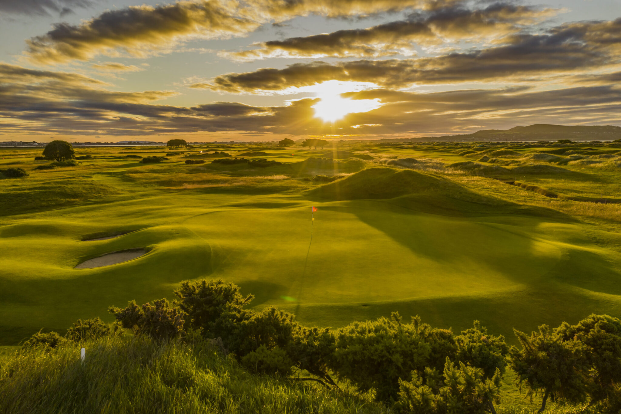The 12th green at The Royal Dublin Golf Club at sunrise