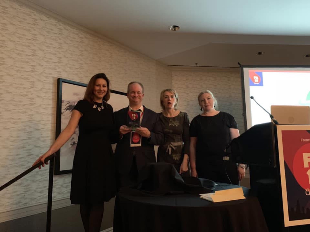 JP Cone collecting an Atout France award