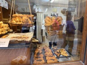 Baskets of bread in the window of a traditional Spanish bakery