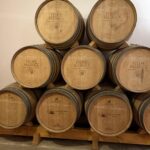 Barrels of Moscatel de Setúbal 2021 resting in the cellar at Filipe Palhoça winery in Palmela, Portugal