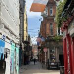 A lane in Temple Bar, Dublin, with the Irish flag flying