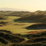 Links dunes glowing at golden hour on Ireland's coast