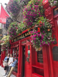 The Temple Bar pub in Dublin covered in flowers