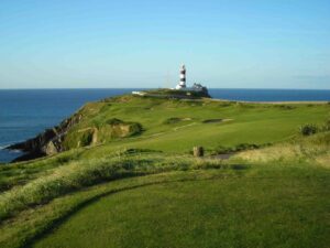 Golf on the Old Head of Kinsale, County Cork, lighthouse beyond