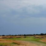 Pot bunkers guarding a links fairway on England's Golf Coast