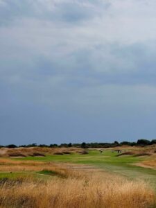 Pot bunkers guarding a links fairway on England's Golf Coast