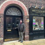 JP outside Shuttleworth's on the Coronation Street set