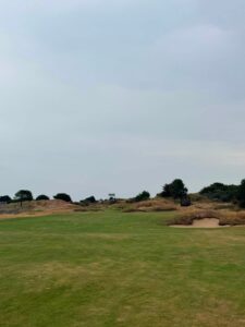 A wide links fairway under a big sky on England's Golf Coast