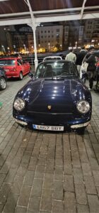 A classic Porsche 911 at a night-time car meet in northern Spain