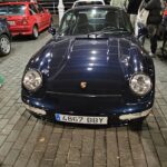 A classic Porsche 911 at a night-time car meet in northern Spain