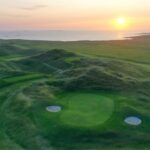 Aerial view of a green among the dunes at Carne Golf Links, County Mayo