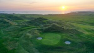 Aerial view of a green among the dunes at Carne Golf Links, County Mayo