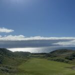 A links fairway running through the dunes towards the sea in Ireland