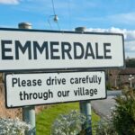 The Emmerdale village sign in Yorkshire, England — the famous TV village