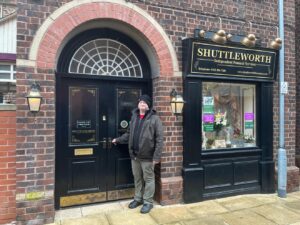 JP Cone outside Shuttleworth's on the Coronation Street set