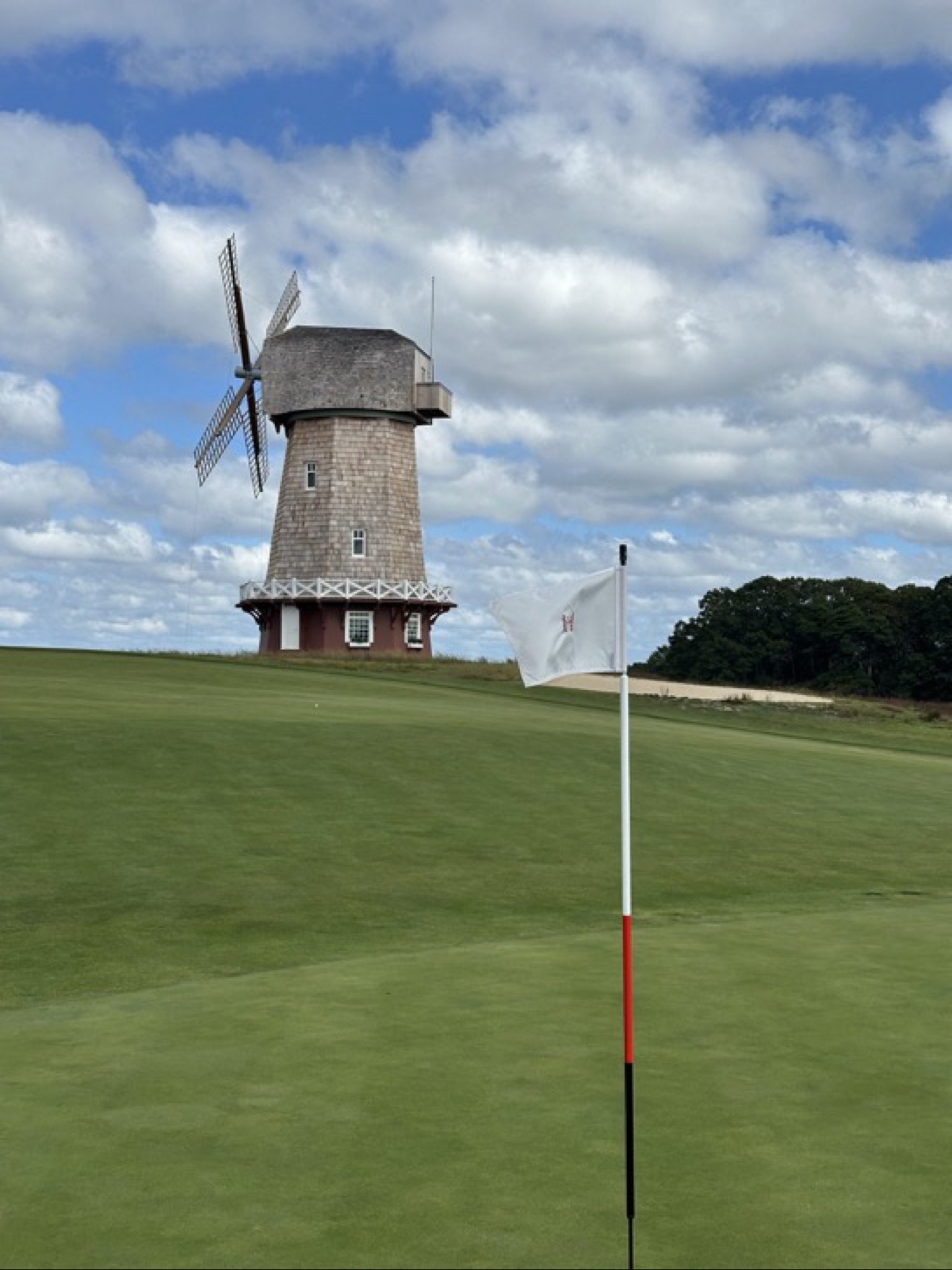 Windmill beside a golf course