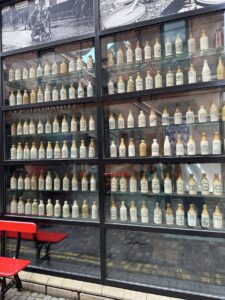 Antique Belfast stoneware bottles on display in the Cathedral Quarter