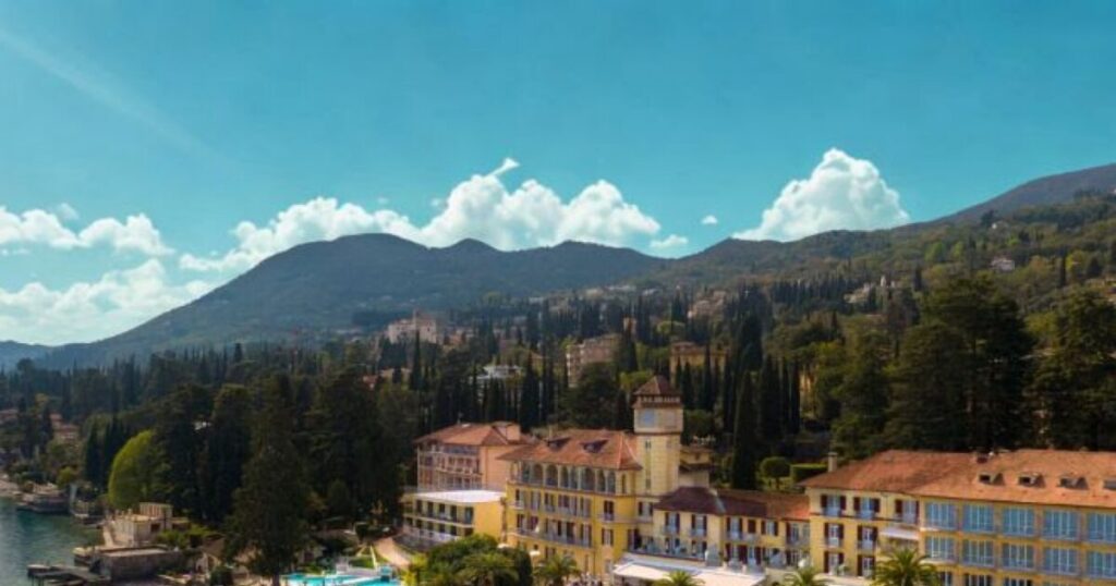 A grand lakeside hotel with gardens and a pool on Lake Garda, Italy