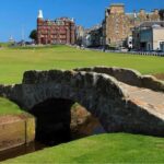 The Swilcan Bridge on the 18th hole of the Old Course, St Andrews, with the town behind
