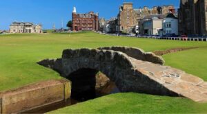 The Swilcan Bridge on the 18th hole of the Old Course, St Andrews, with the town behind