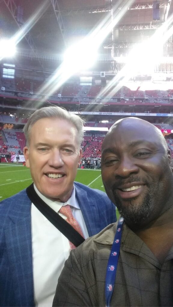 Irv Smith with John Elway