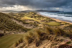 A wild links golf course in County Donegal beneath the mountains