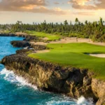 A golf green perched on coral cliffs above the turquoise Caribbean in the Dominican Republic