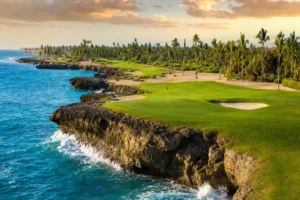 A golf green perched on coral cliffs above the turquoise Caribbean in the Dominican Republic