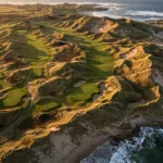 Aerial view of an Irish links golf course among towering dunes on the Atlantic coast