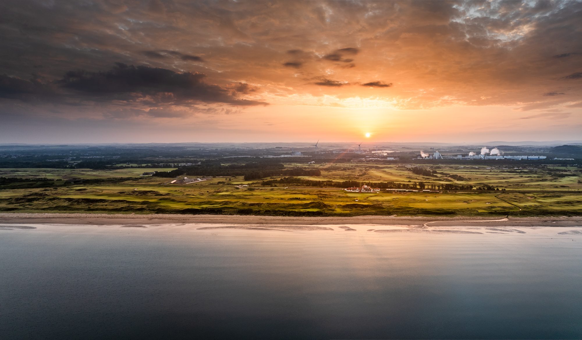 Sunrise over Western Gailes Golf Club — the links and clubhouse between the railway and the Firth of Clyde, Ayrshire